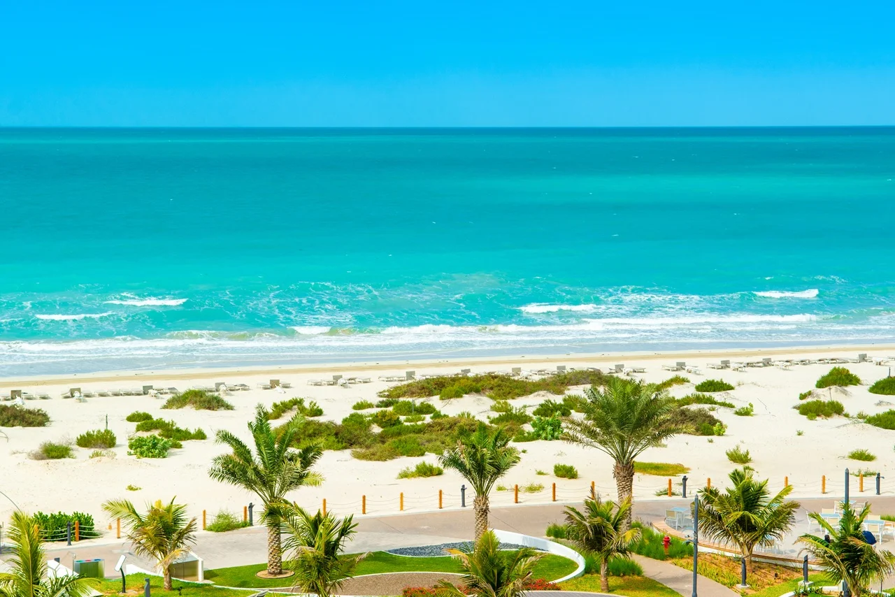 Beautiful landscape of clear turquoise ocean and sandy beach in Saadiyat island