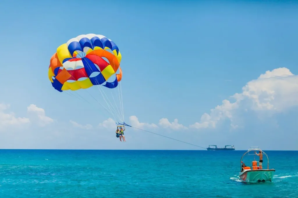 Best Summer Activities in Dubai: Jet Skiing, Kayaking, Paddleboarding and more 3 Parasailing - Summer Activities in Dubai